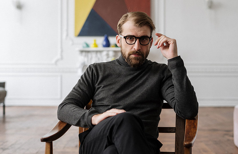 Man sitting on chair staff-2